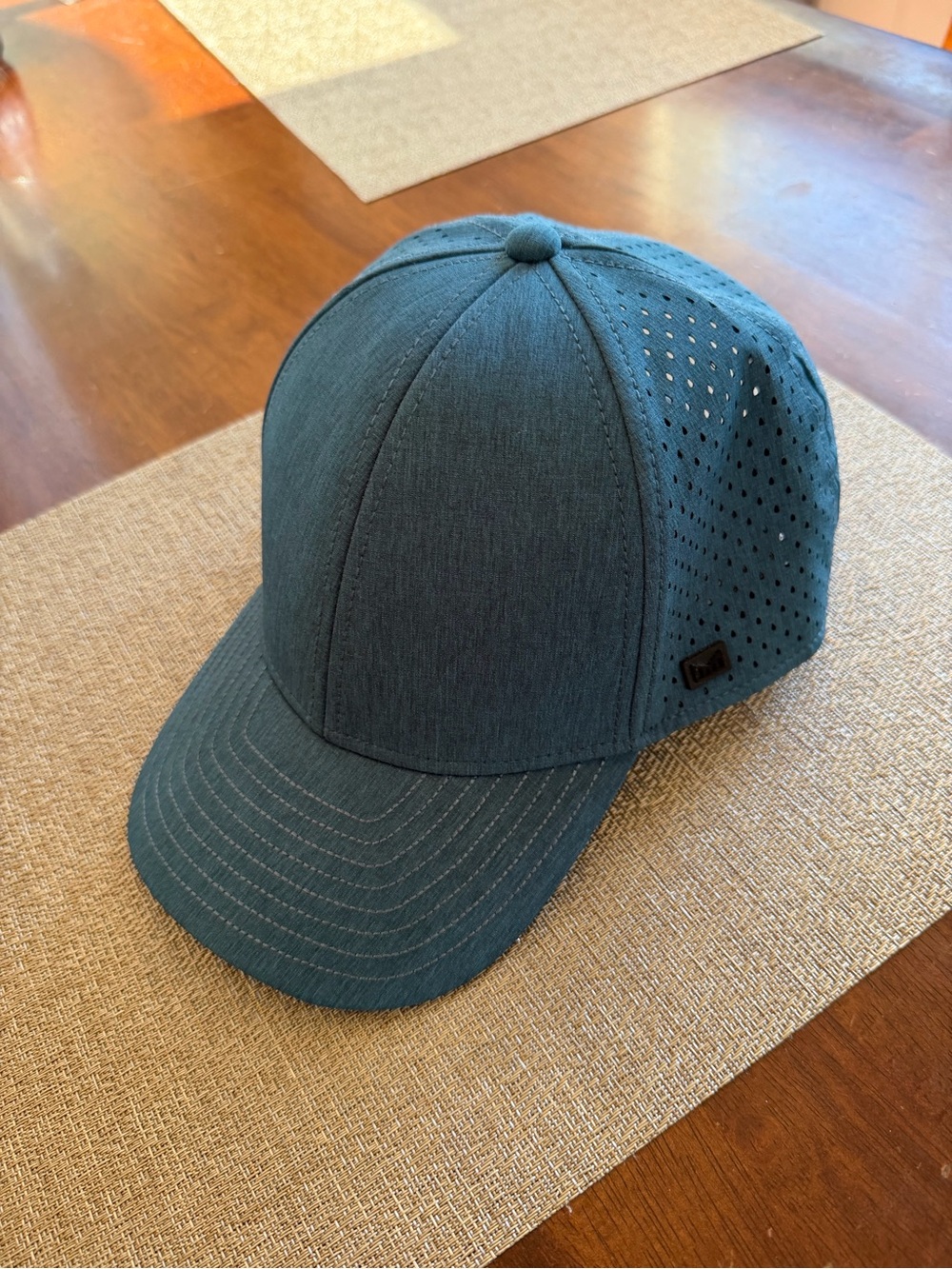 Melin hat. NWOT.